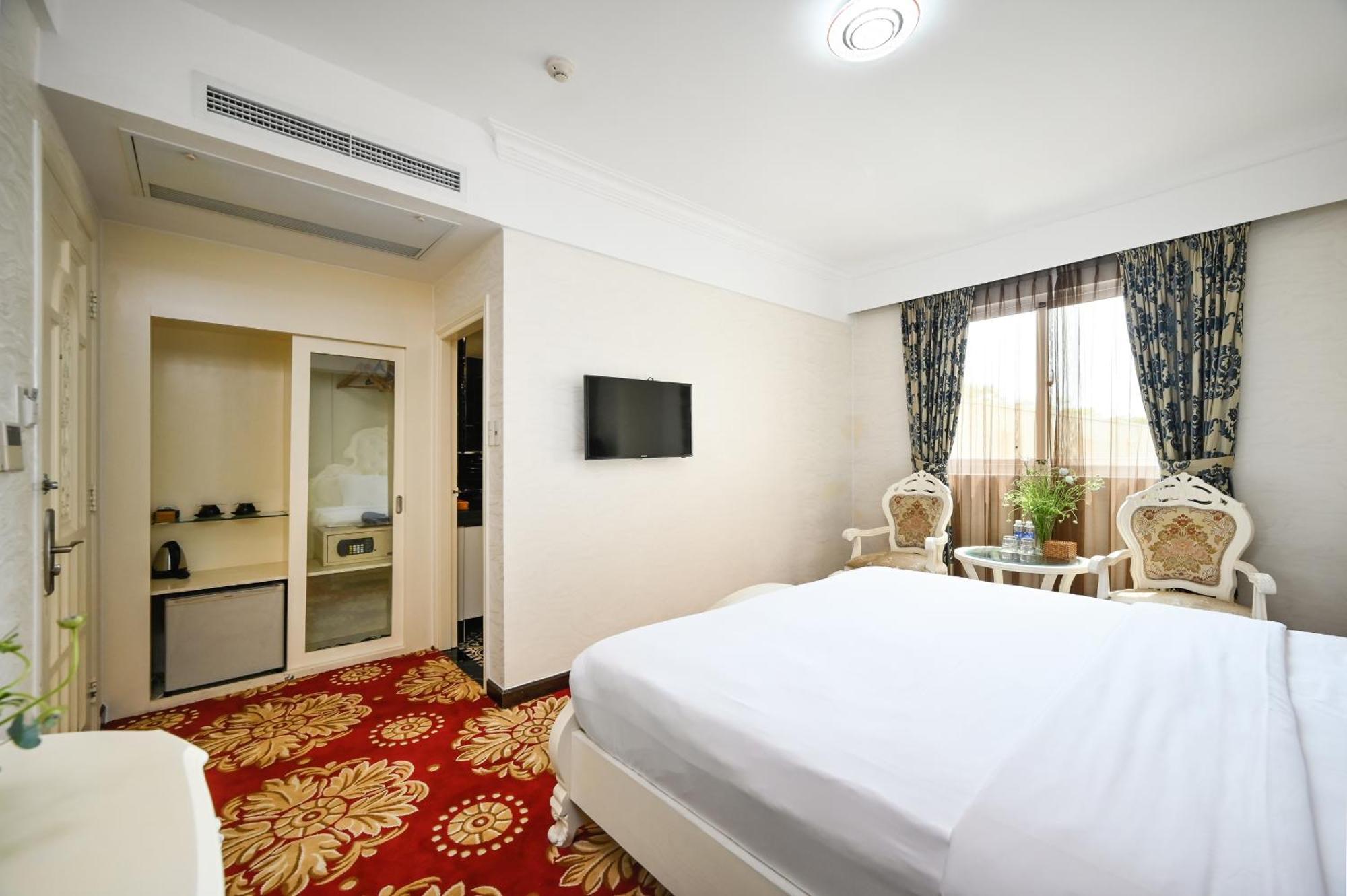 California Saigon Hotel & Rooftop Pool โฮจิมินห์ซิตี้ ห้อง รูปภาพ