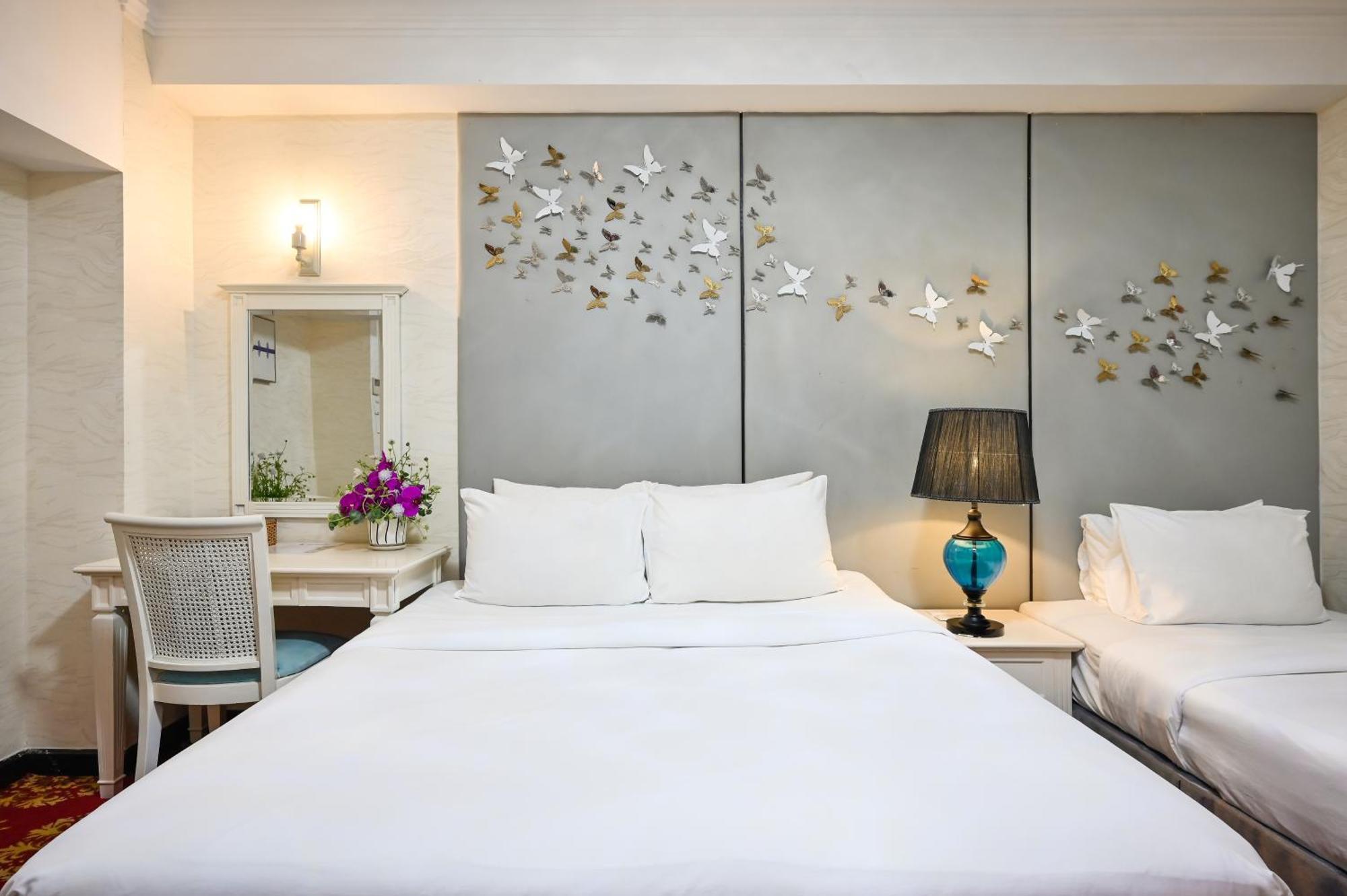 California Saigon Hotel & Rooftop Pool โฮจิมินห์ซิตี้ ห้อง รูปภาพ