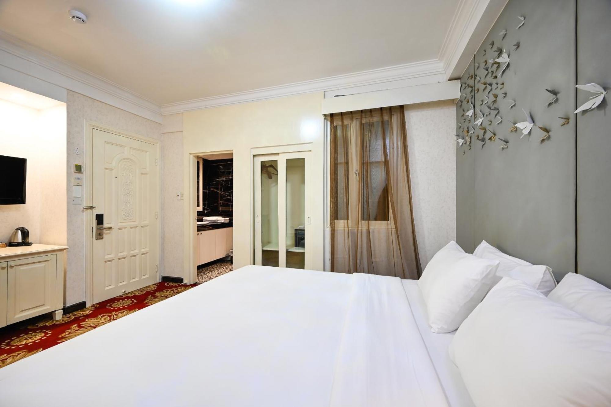 California Saigon Hotel & Rooftop Pool โฮจิมินห์ซิตี้ ห้อง รูปภาพ