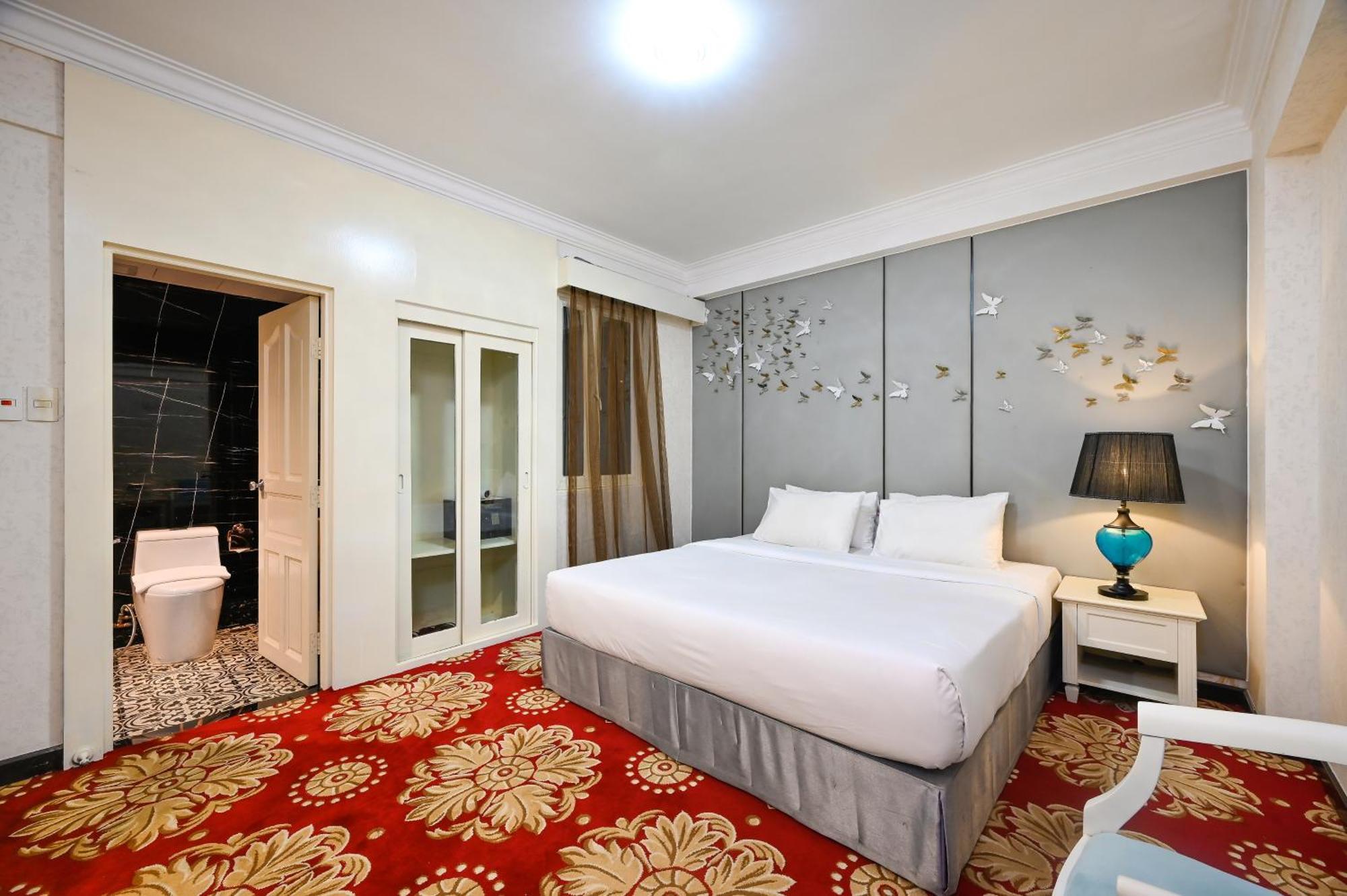 California Saigon Hotel & Rooftop Pool โฮจิมินห์ซิตี้ ห้อง รูปภาพ
